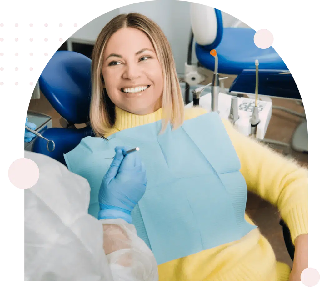 Smiling dental patient in chair
